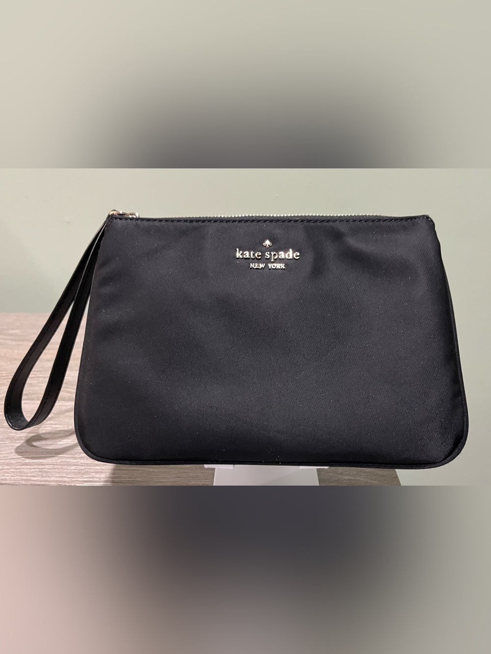 Kate Spade Black Wristlet with Gold Logo